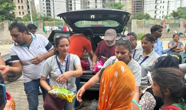 ईएमसीटी द्वारा नोएडा में बाढ़ प्रभावित क्षेत्र में बांटा भोजन और दी राहत सामग्री